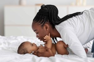 Read more about the article Why Do Babies Grab Your Face: Potential Reasons