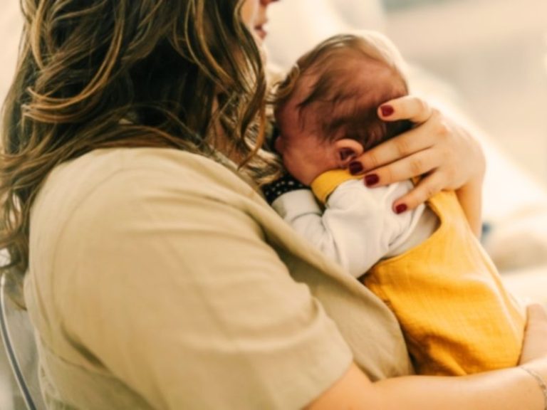 Can You Hold a Newborn Baby on Your Period