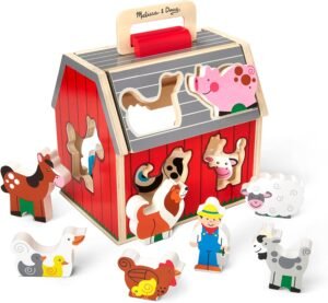 Read more about the article Little Farmers’ Fun: A Review of the Melissa & Doug Wooden Take-Along Barn Toy